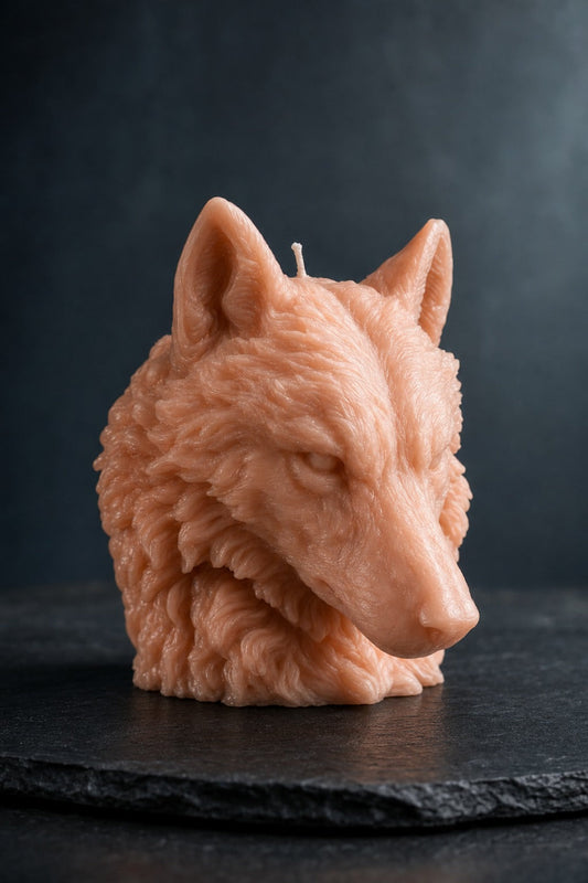 EnZebra Wolf Head Sculptural Candle — salmon peach wax on dark slate