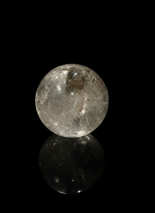Zebra Industries, LLC collector grade clear garden quartz sphere with visible chlorite phantom inclusions on black