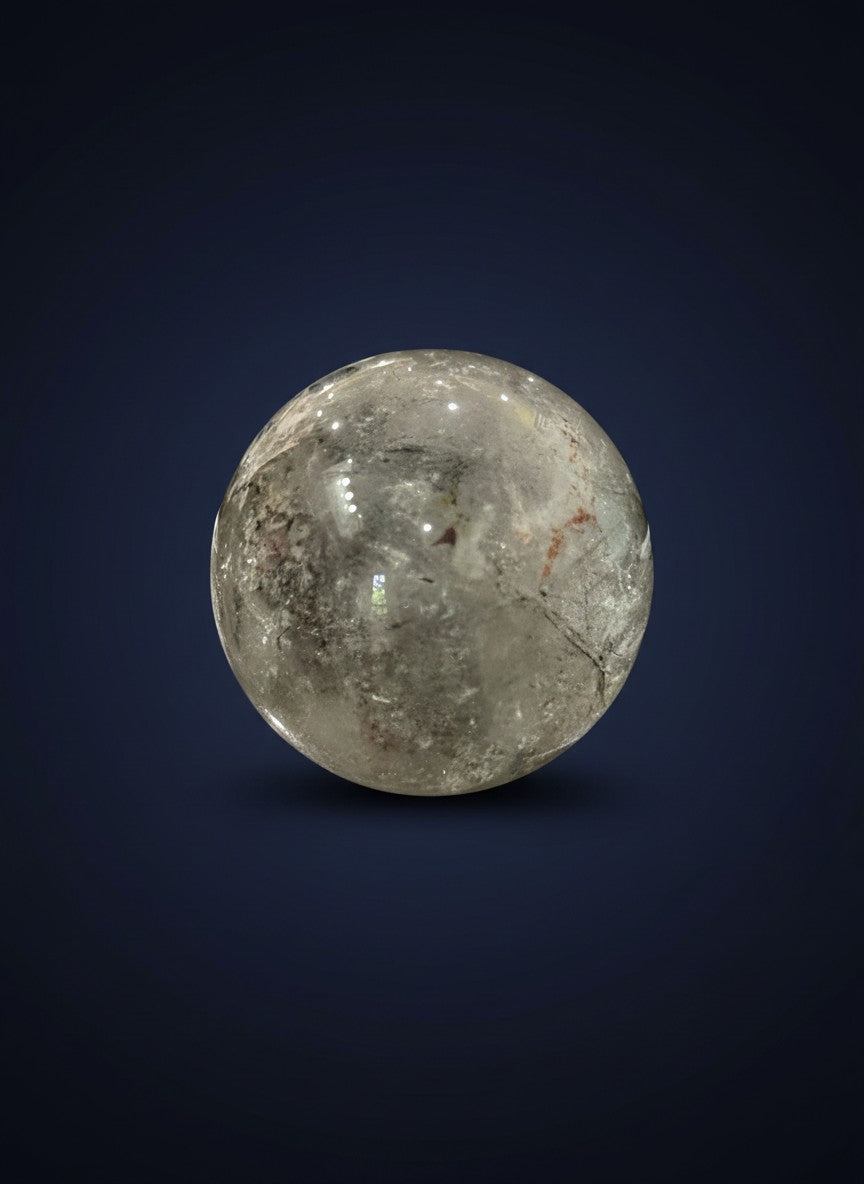 Zebra Industries, LLC polished garden quartz sphere with natural mineral inclusions and clear crystal finish.