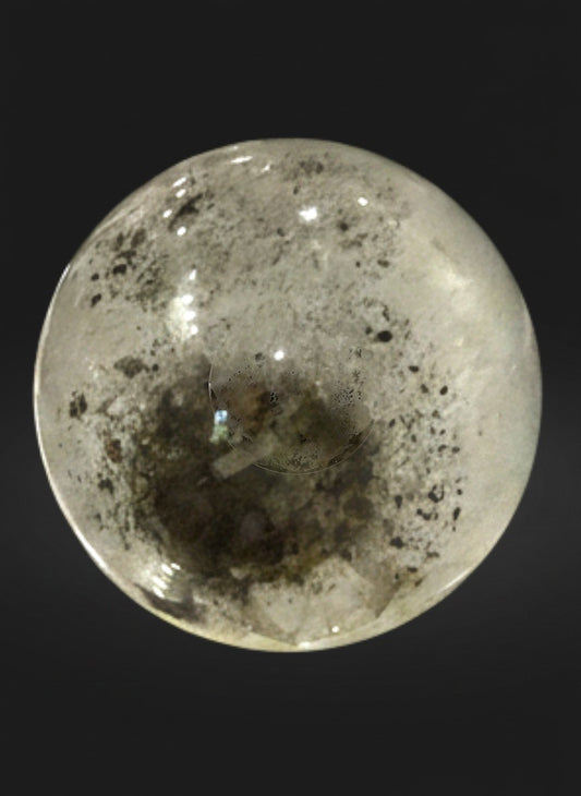 Zebra Industries, LLC collector-grade garden quartz sphere with green chlorite phantom inclusions on dark background