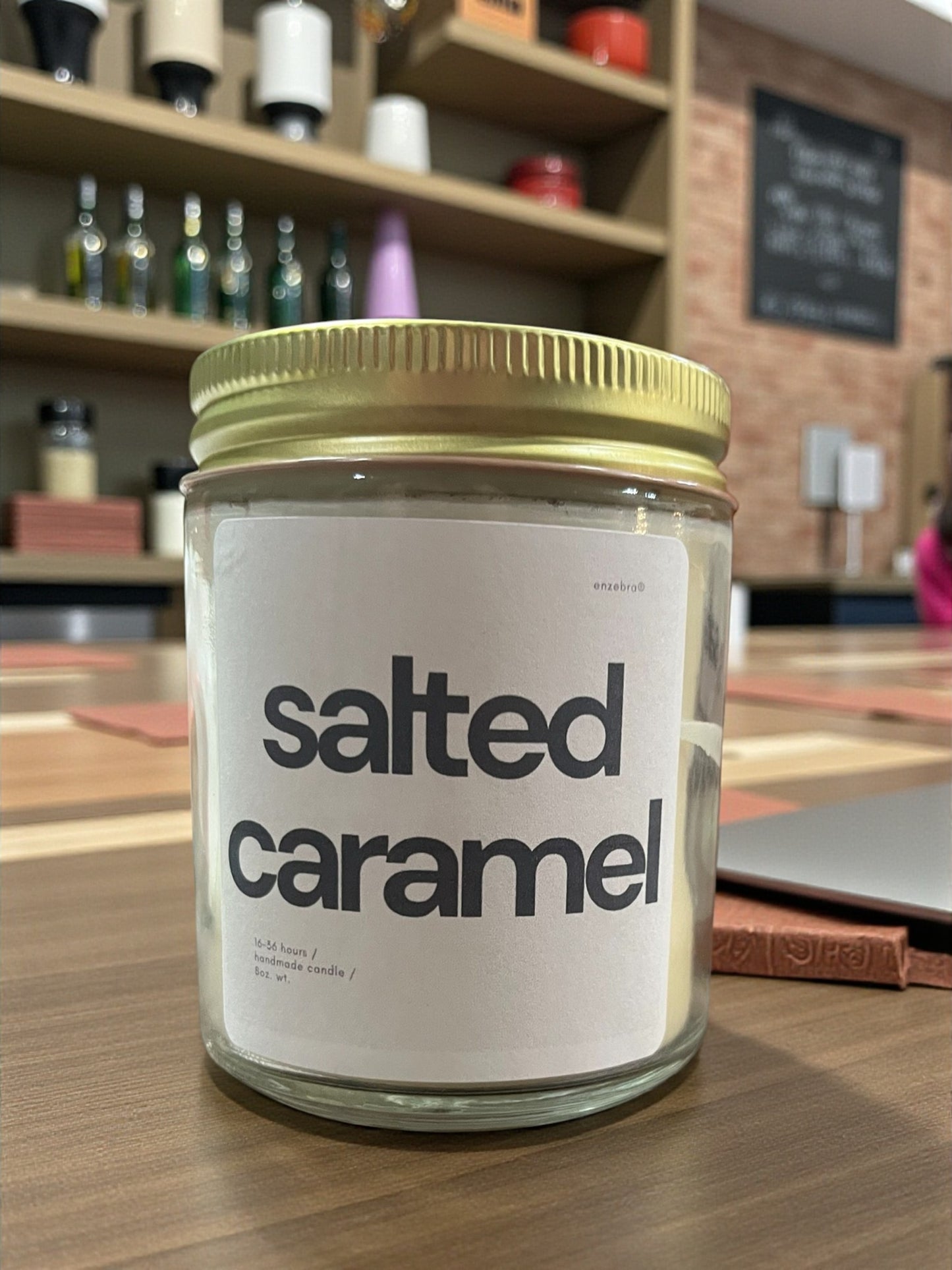 EnZebra Salted Caramel No. 21 — 10 oz clear glass candle vessel detail view