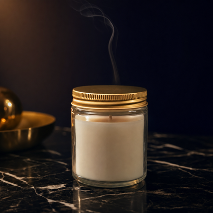 Salted Caramel No. 21 Candle — luxury editorial product photograph on dark Marquina marble with warm 2700K sidelight and gold lid