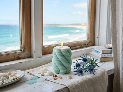 EnZebra Mint Blue Swirl Pillar on coastal windowsill — lifestyle