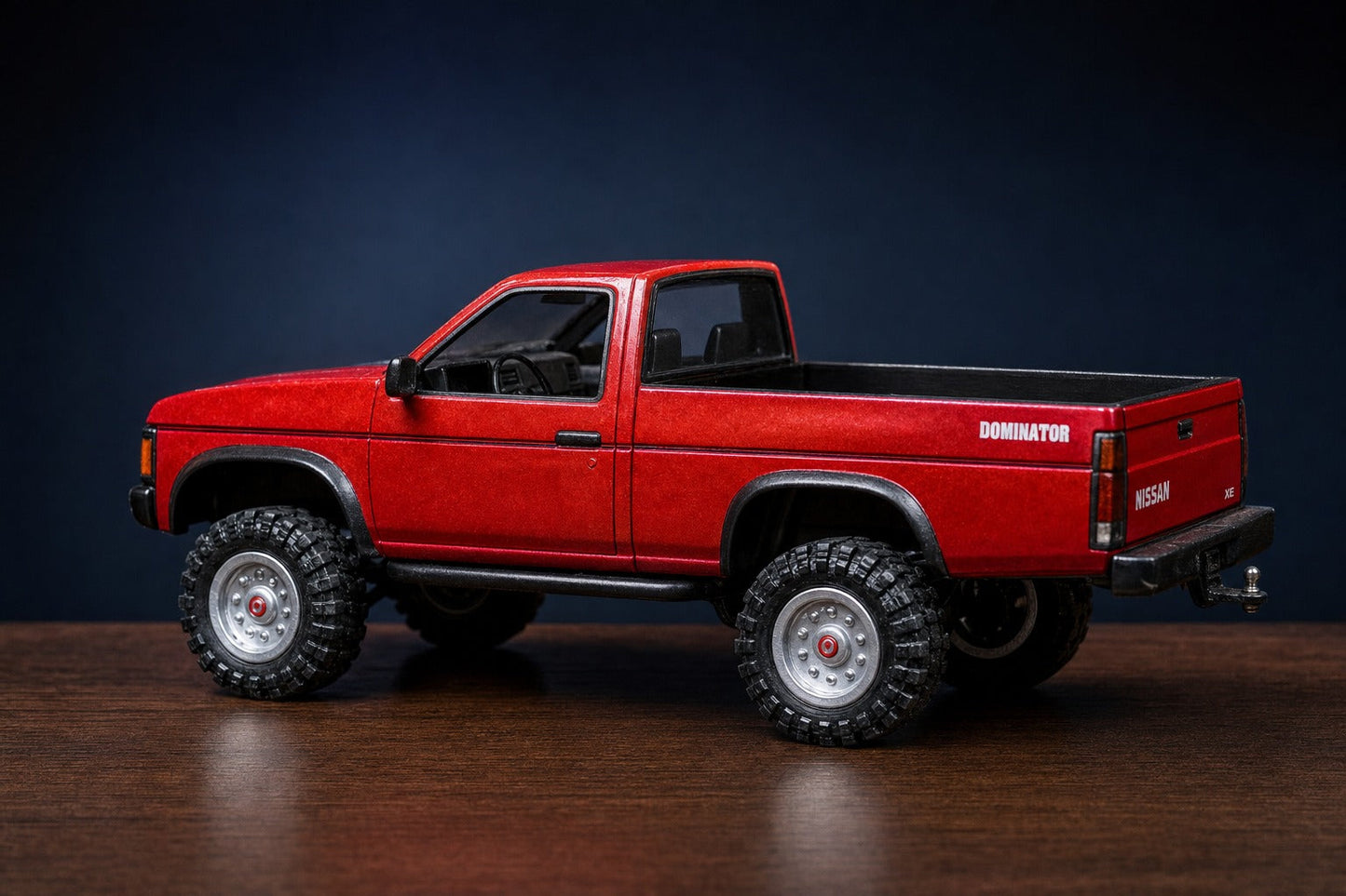 Garland Workshop Dominator Nissan D21 — side profile, red hand-painted wood body