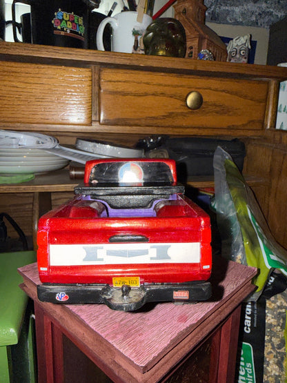GWL-VEH-002 Dominator 1995 Nissan Pickup — rear view, custom tailgate, license plate AZH 103, hitch detail