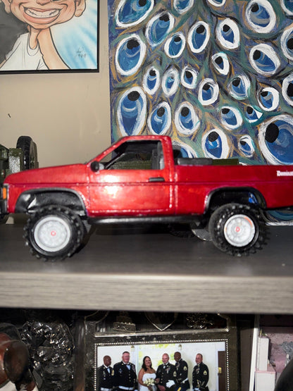 GWL-VEH-002 Dominator 1995 Nissan Pickup handmade wood — driver side profile, lifted stance, rubber off-road tires, Dominator badge
