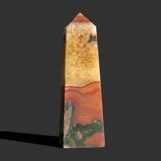 Zebra Industries, LLC polished carnelian agate tower with druzy quartz geode cavity and natural mineral banding.