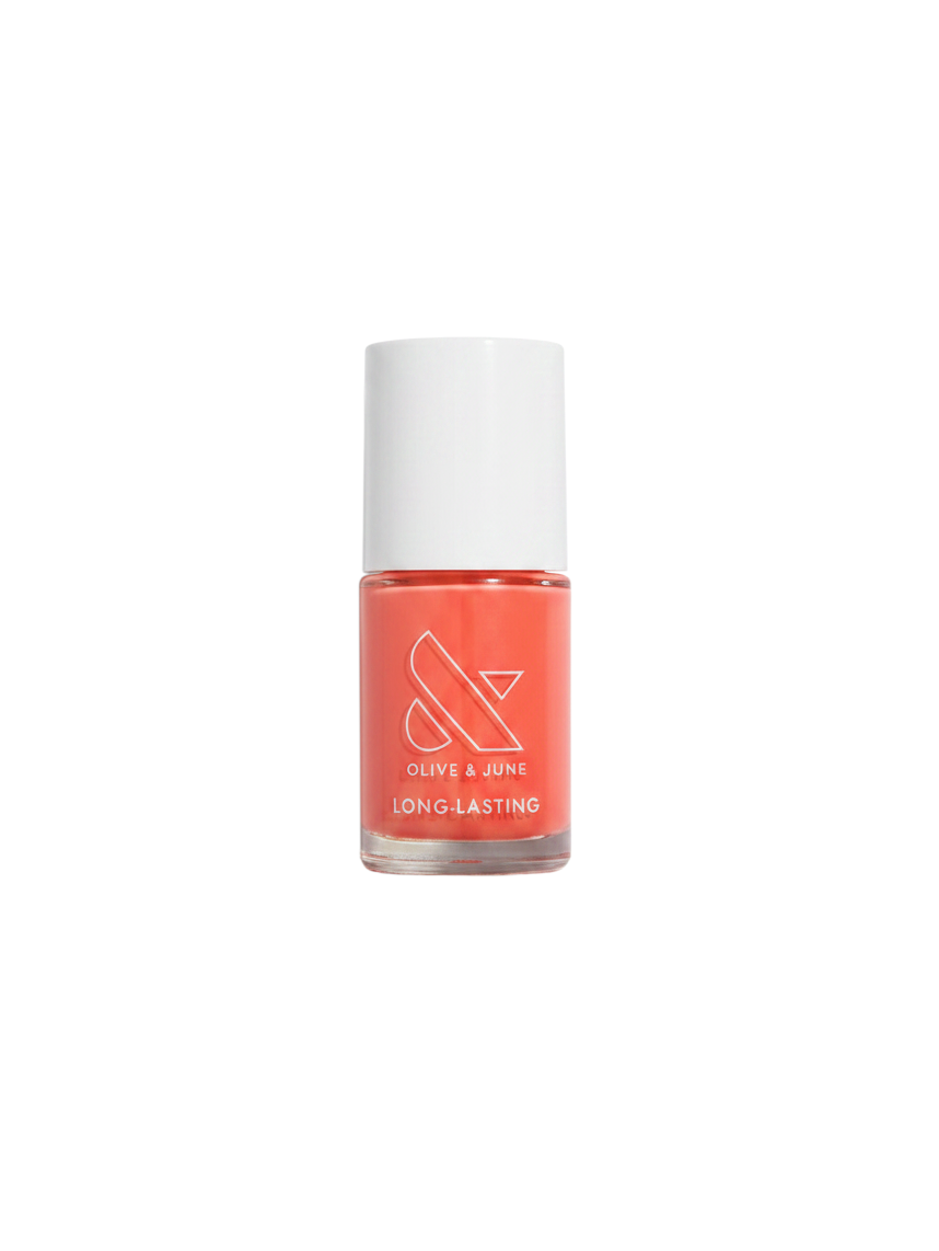 Zebra Industries, LLC Olive & June long-lasting nail polish in Field Day, a vibrant coral red 15-free salon formula.