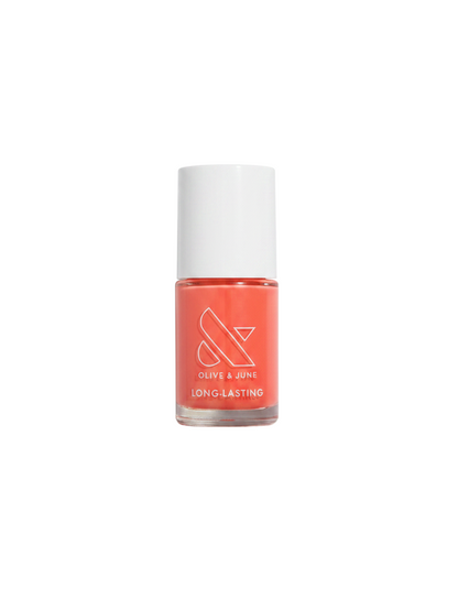 Zebra Industries, LLC Olive & June long-lasting nail polish in Field Day, a vibrant coral red 15-free salon formula.