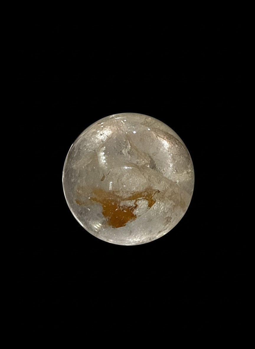 Zebra Industries, LLC collector grade garden quartz sphere with natural golden-brown iron oxide inclusions.
