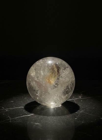 Zebra Industries, LLC collector grade clear garden quartz sphere with visible chlorite phantom inclusions.