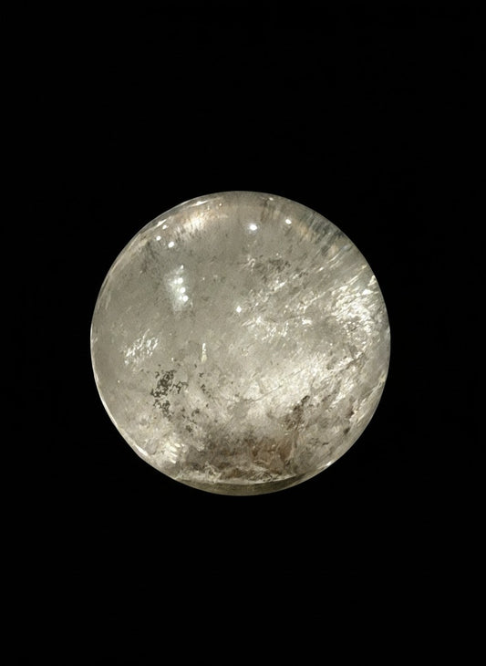 Zebra Industries, LLC collector grade Garden Quartz crystal sphere with natural mineral inclusions on black background