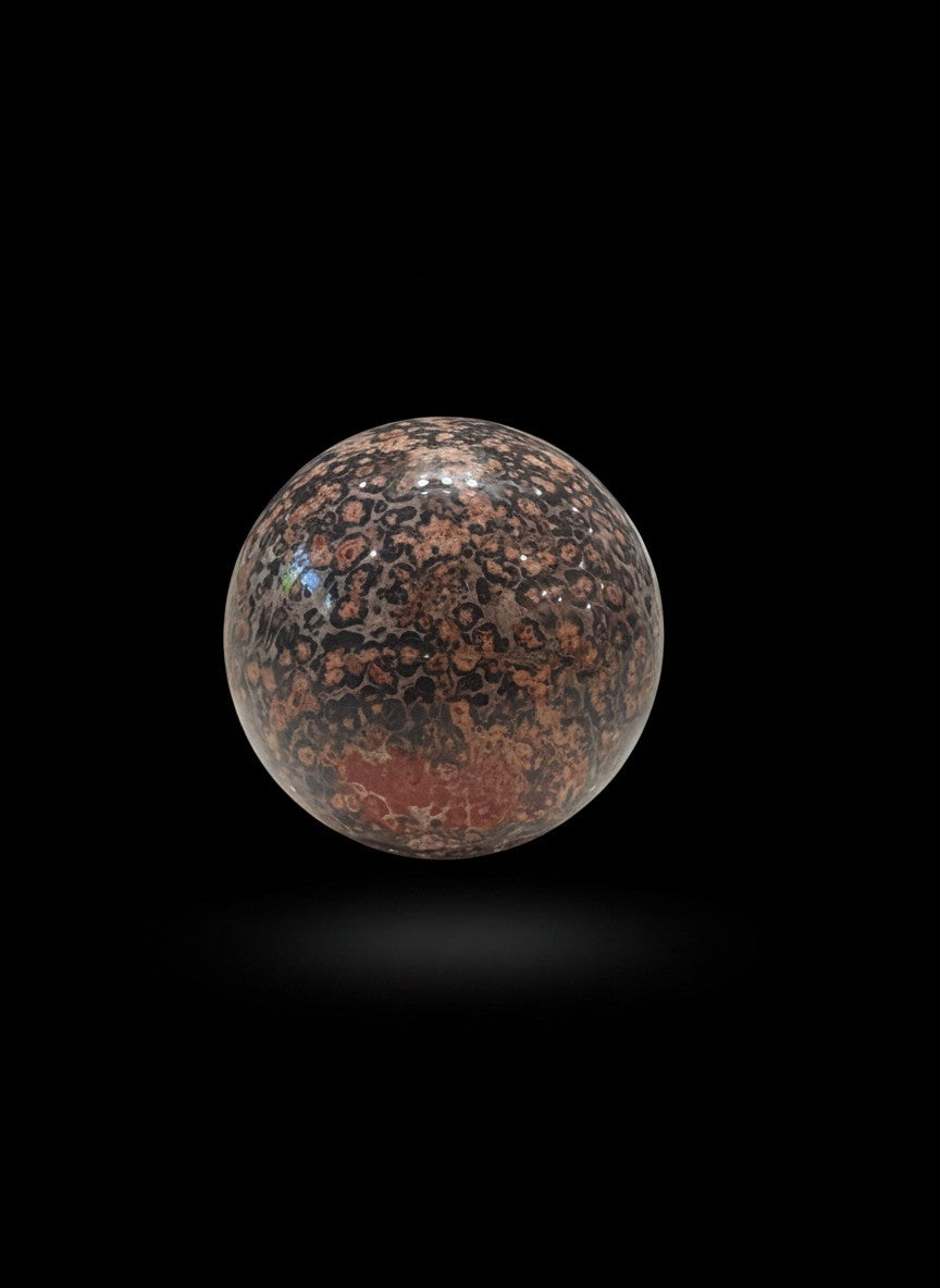 Zebra Industries, LLC polished leopard skin jasper sphere with dark matrix and reddish-tan orbicular inclusions